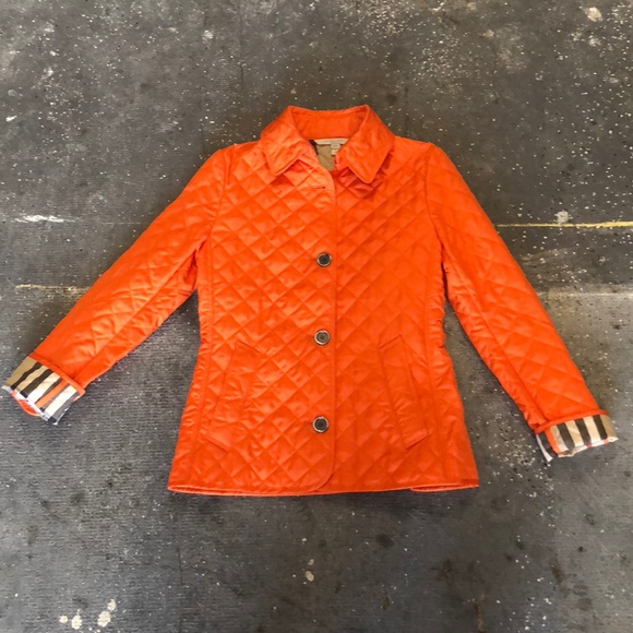 orange burberry coat